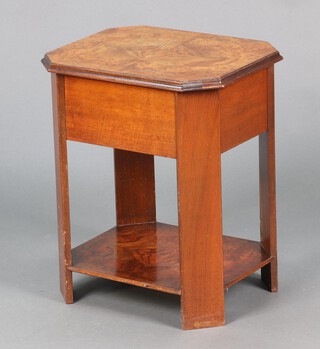 A 1930's Art Deco walnut lozenge shaped quarter veneered sewing table with hinged lid and undertier 53h x 45w x 38d