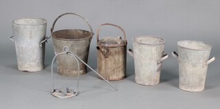 A galvanised watering can, a bucket and three twin handled pails