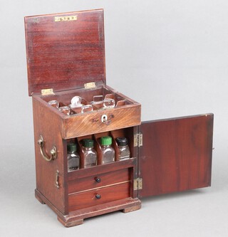 A Georgian mahogany apothecaries cabinet, the hinged lid revealing 6 panel cut bottles, the cupboard to the front fitted 4 later bottles, compartmented drawer with sliding lids and 1 other long drawer with ivory escutcheon and brass swan neck drop handles to the sides 24cm h x 18cm w x 16cm d Ivory Exemption Certificate JPKEES4E