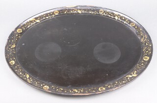 A Victorian oval black and gilt papier mache tray 63cm x 51cm 