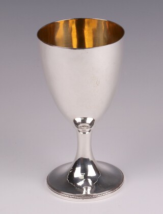 A George III silver goblet with parcel gilt interior, on a spreading circular foot, London 1786, by Hester Bateman, 160 grams 