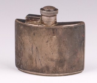 A silver hip flask with engine turned decoration, Sheffield 1939, by Walker & Hall, 8cm, 98 grams 