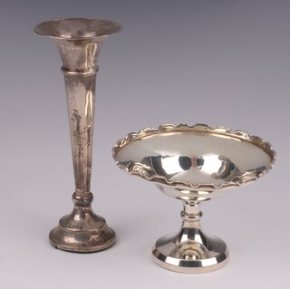 A circular silver pedestal bowl raised on a spreading foot, Birmingham 1926, makers marks rubbed, together with a silver specimen vase Birmingham 1908 by Hayes & Co. 14cm  