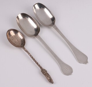A dog nose pattern silver spoon possibly Thomas Bradbury & Son Glasgow 1837, a George III silver apostle spoon London 1800 by Daniel Charles Houle, 123 grams and a white metal dog nose spoon (unmarked)