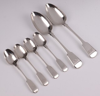A pair of Continental silver Old English pattern table spoons marked 1855, monogrammed, 115 grams, together with 4 William IV silver fiddle pattern teaspoons, monogrammed, London 1833 by John, Henry & Charles Lias, 86 grams 