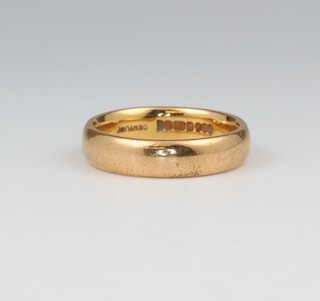 A 22ct plain yellow gold wedding band, size K 1/2, 6.2 grams 