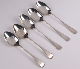 A pair of George IV silver Old English pattern pudding spoons, London 1826, makers marks rubbed and 3 rat tail Old English pattern pudding spoons Sheffield 1904 monogrammed E, 202 grams 