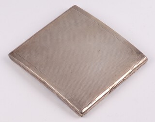 A silver cigarette case with engine turned decoration, the interior inscribed, Chester 1932 by Charles Perry & Co., 147 grams 