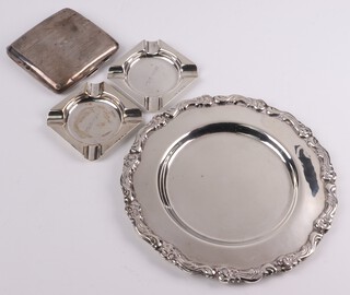 A pair of square engraved silver ashtrays Birmingham 1937 by L A Davenport Ltd, a silver cigarette case with engined turned decoration Birmingham 1924, 138 grams and a circular dish with cast border 18cm 