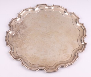 An Indian silver salver with bracketed border, engraved inscription "To Brigadier and Mrs M H Cox, with best wishes from the members of Iscon Club Durgapur India July 1959",  by Cooke & Kelvey,  30cm, 799 grams 