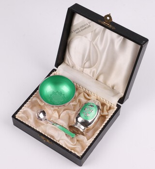 A Danish  green enamelled and silver salt and pepper, cased, complete with salt spoon marked Meka Sterling Denmark, 59 grams 