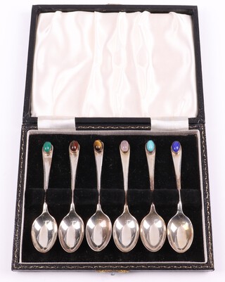 A stylish cased set of 6 silver Old English pattern coffee spoons, each set a cabochon polished hardstone, Birmingham 1973 by Shipton & Co. Ltd., 56 grams 