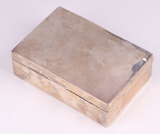 A rectangular plain silver cigarette box with hinged lid, monogrammed O, 4cm x 13cm x 9cm, marks rubbed  