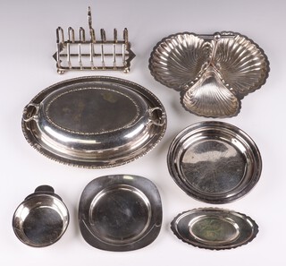 A silver plated 7 bar toast rack on bun feet, do. 3 section hors d'oeuvres dish, entree dish and other items of silver plate 