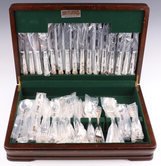 Butters Cutlery, an 83 piece canteen of Old English pattern silver plated flatware comprising 8 dinner knives, 8 dinner forks, 8 tea knives, 8 soup spoons, 8 fish knives, 8 fish forks, 8 pudding spoons, 8 pudding forks, 4 serving spoons, 8 teaspoons, 8 coffee spoons, all in original packaging and contained in a canteen box 