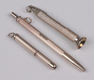 A silver toothpick with engine turned decoration 1996 by William Manton, an engine turned silver cigar drill Birmingham 1994 by S J Rose & Son (dented), silver propelling pen with engine turned decoration Birmingham 1997 by William Manton, 26 grams  