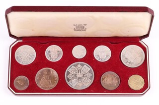 A Queen Elizabeth II Coronation 10 coin set - crown, half crown, 2 shilling, 1 shilling (x2), sixpence, one penny, half penny, threepence and farthing, in original red and gilt fitted case  