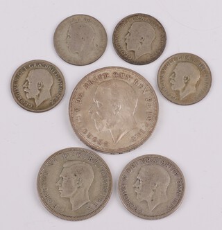 A George V 1935 silver crown together with a small quantity of George V and George VI pre-1947 silver coinage, total weight 74.5 grams 