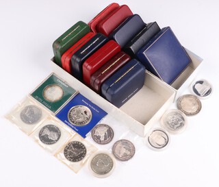 A large quantity of mainly 1970's commemorative silver coinage and medals, all cased, 410 grams 