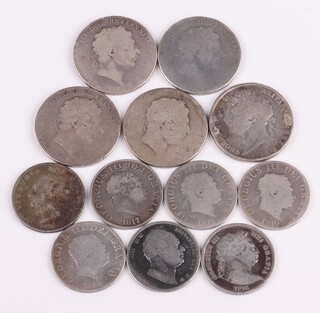 A collection of Victorian and Georgian very rubbed crowns and half crowns, 235 grams 