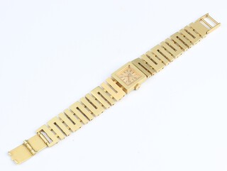A lady's Vulcain vintage wristwatch with square gilt dial, the movement marked NSR, contained in a gold plated case with integral bracelet marked Depose 
