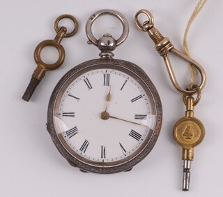 An open faced, key wind fob watch with enamelled dial, Roman numerals, contained in a 935 engraved case, complete with 2 keys  