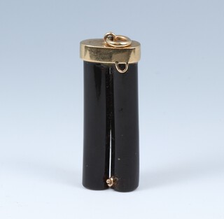 A black coral pendant with gilt metal mount 