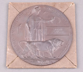 A First World War death plaque to Sidney Coulter complete with cardboard case and original envelope 