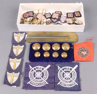 A silver Army Emergency Reserve of Officer's lapel badge Birmingham 1939, a Ssafa lapel badge, a Leicestershire Aero Club enamelled badge, a brass button stick, various original cloth badges, etc 
