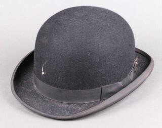 A gentleman's black bowler hat, size 7 1/8 