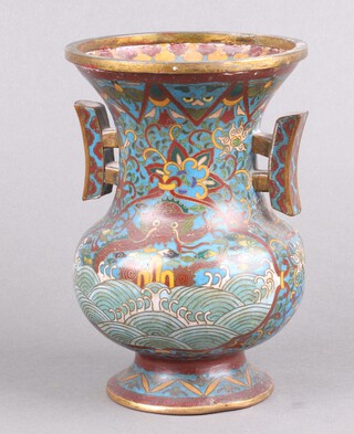 A Japanese blue ground cloisonne enamelled twin handled urn, raised on a circular foot 18cm 