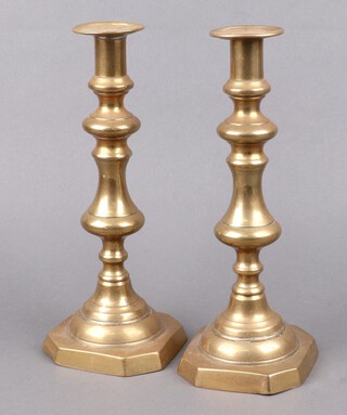 A pair of 19th Century brass candlesticks 