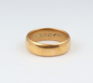 A 22ct yellow gold wedding band, size N, 8.4 grams 