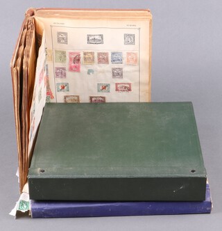 A brown standard album of world stamps - Europe, GB, mint and used, a green ring bound album of Commonwealth stamps, Sierra Leone, Nigeria, Ghana, loose leaf album and loose leaves 