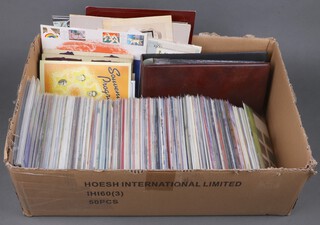 A collection of Queen Elizabeth II GB presentation stamps, approximately 400 sets, together with other stamps, first day covers 