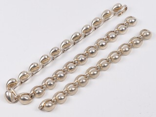 A stylish silver necklace 43cm together with a matching bracelet 19cm, 146 grams, marked 925 MM&WB 