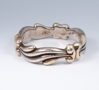 A stylish silver hollow bangle  7.5cm diam. 33 grams 