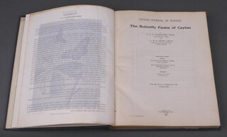 Woodhouse, L G O and Henry, G M R, "The Butterfly Fauna of Ceylon (Sri Lanka)", Ceylon Government Press Colombo 1942, First Edition Presentation Copy number 115  (stamped to paste down), bound in original blue cloth and gilt, tissue guarded plates throughout, 4to.,  incomplete typed receipt document from the Surveyor General's office in Colombo within