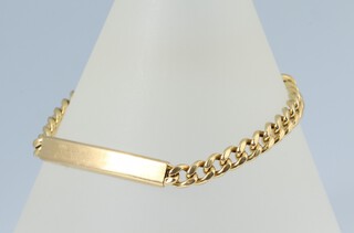 A yellow metal unmarked identity bracelet, 16cm