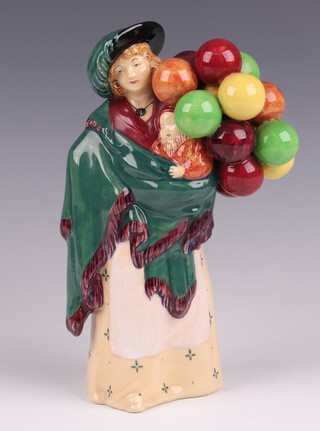 A Royal Doulton figure - The Balloon Seller HN583 173.5.30, 22cm 