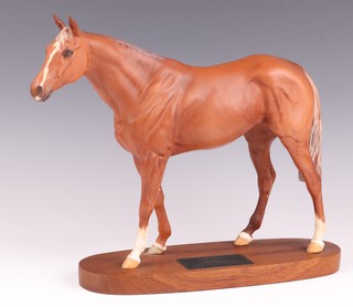 A Beswick figure of the racehorse Grundy on an oval base 28cm 