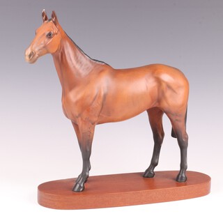A Beswick figure of the racehorse Arkle, on an oval wooden base 30cm h