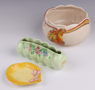 A Clarice Cliff Newport Pottery circular brown glazed bowl with leaf decoration, 3889, 16cm, a ditto yellow glazed leaf shaped dish 921 13cm and a rectangular vase 8cm 