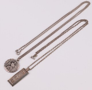 A silver ingot pendant hung on a fine silver chain, a silver St Christopher hung on a silver belcher link chain 31 grams 
