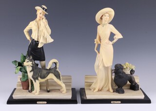 A.D.L. by Vittorio Tessaro, a pair of resin figures of 2 standing ladies with dogs 28cm 