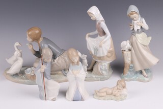 A Lladro figure of a seated girl feeding geese 16cm, ditto standing girl with rabbit impressed 5, 23cm, ditto girl with doves (chip 1 wing) 22cm, ditto seated shepherd 15cm, girl (a/f) 15cm and 1 other of a baby B2291 9cm 