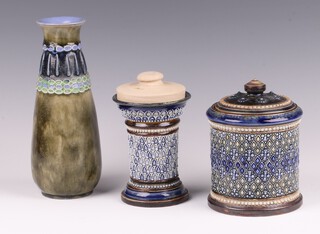 A Doulton Lambeth blue salt glazed vase, base marked Doulton Lambeth 1879 11cm, a Doulton Lambeth blue glazed tobacco jar and cover impressed 1879 13cm, complete with inner lid, together with a Royal Doulton green salt glazed vase 8128 19cm 