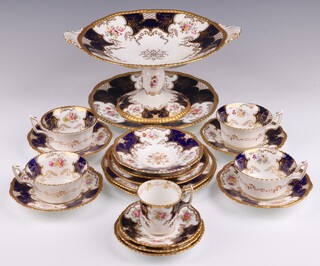 A 19 piece Coalport blue and gilt banded dessert/tea service with floral decoration comprising twin handled comport 30cm (a/f), bread plate (crazed), 2 side plates, 6 tea cups (2 cracked), 4 saucers (1 cracked), 1 coffee cup (cracked), 3 coffee saucers (1 cracked)