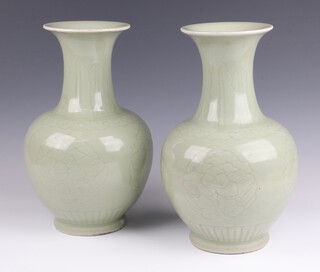 A pair of Celadon club shaped vases 32cm 