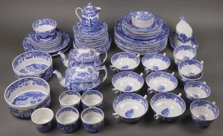 Eighty four various pieces of Copeland Spode Italian pattern dinner/tea ware comprising 10 dinner plates (1 chipped), 1 side plate (cracked), soup bowl, 9 side plates, 14 tea plates (1 cracked), 6 circular dishes, 6 twin handled soup bowls and saucers, 6 tea cups, 10 saucers, sugar bowl, small sugar bowl, large sugar bowl, sauce boat and stand, 2 small teapots, cream jug and cover (f), 2 circular bowls, 4 ramekins (1 cracked), all of varying ages 